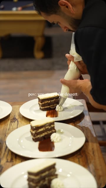 Edgar finishing plated chocolate cake