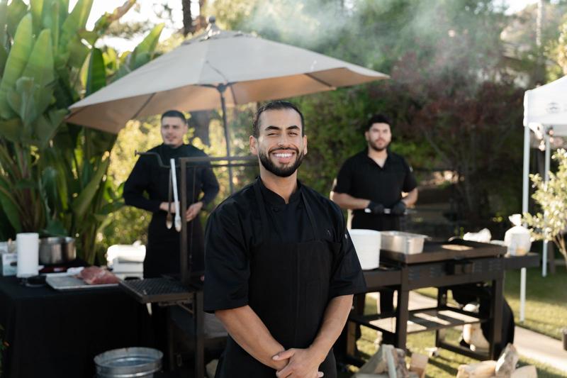 Chef Edgar Meza and team at the grill