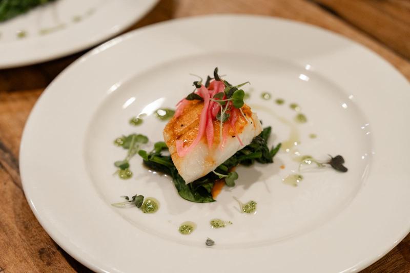 Seared fish with pickled onion
